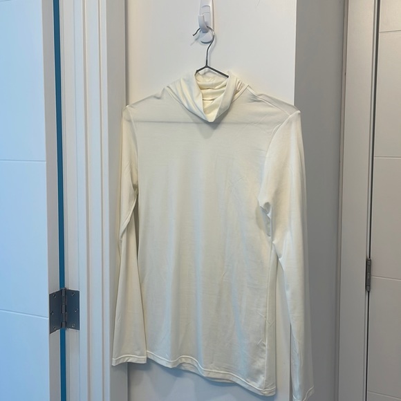 UNIQLO heat-tech turtleneck in off-white - Picture 1 of 2